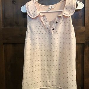 Light pink shirt with black line detailing